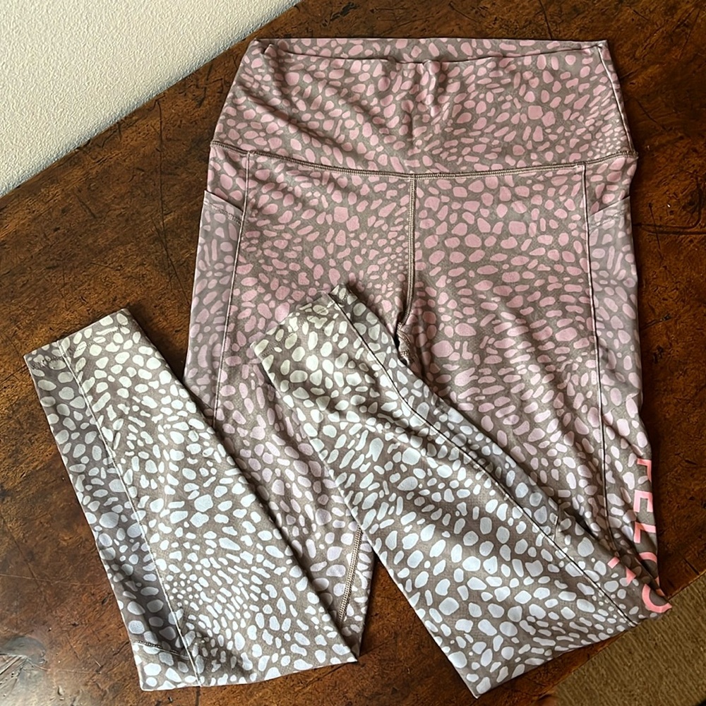 WITH Peloton activewear leggings. Pink ombre color wave.